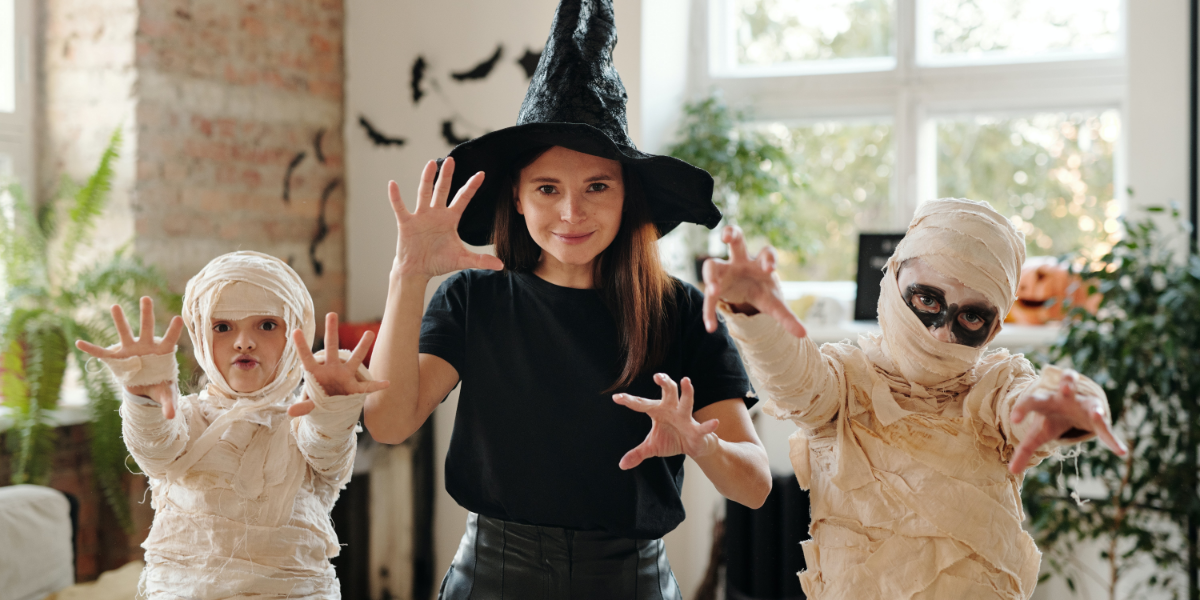 Children dressed up as a witch and mummies