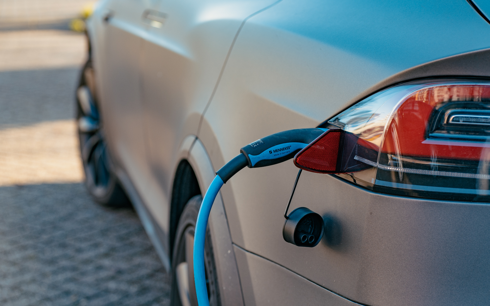Electric vehicle being charged