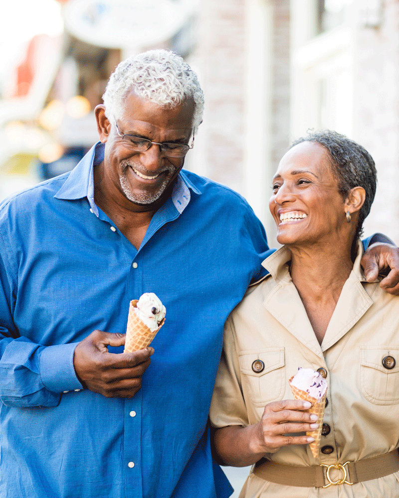 Senior couple eating ice cream