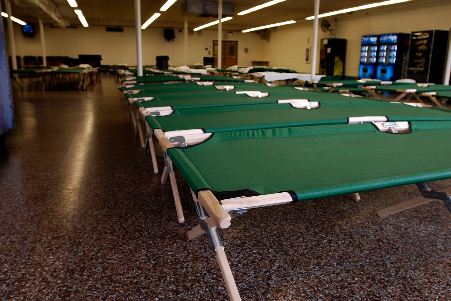 shelter with row of cots