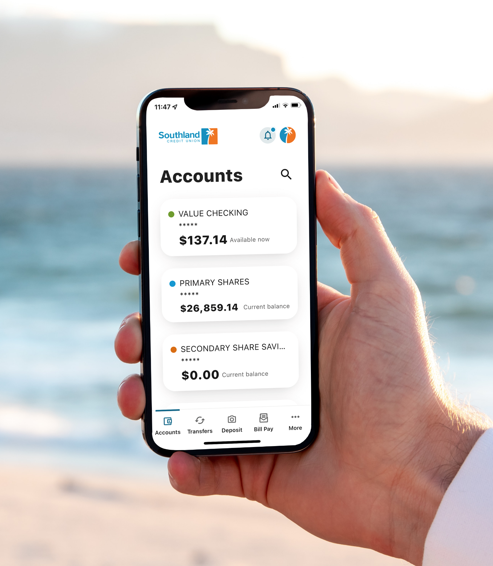 hand holding cell phone with Digital Banking app