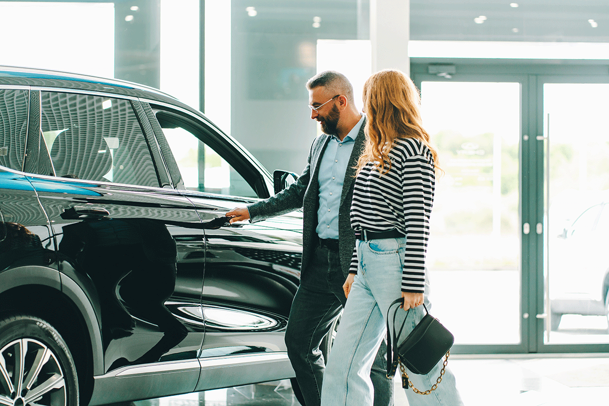 couple shopping for a new car