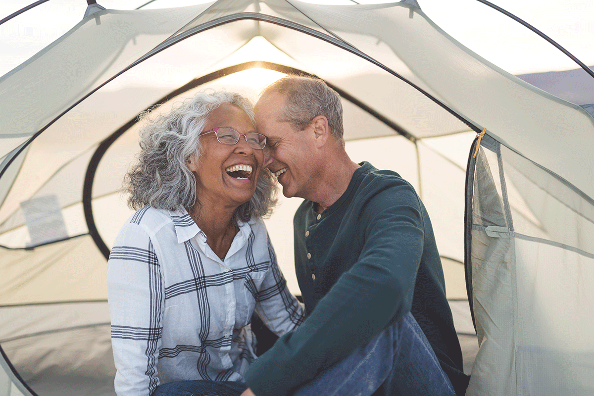 senior couple in a tent