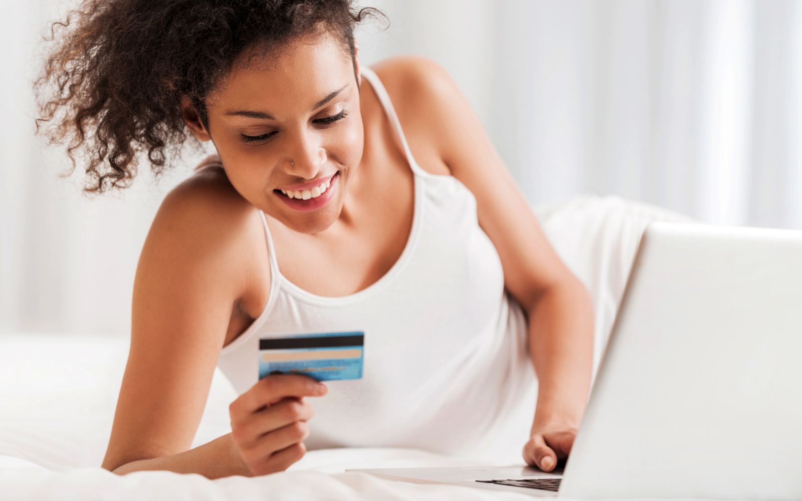 Woman online shopping with credit card